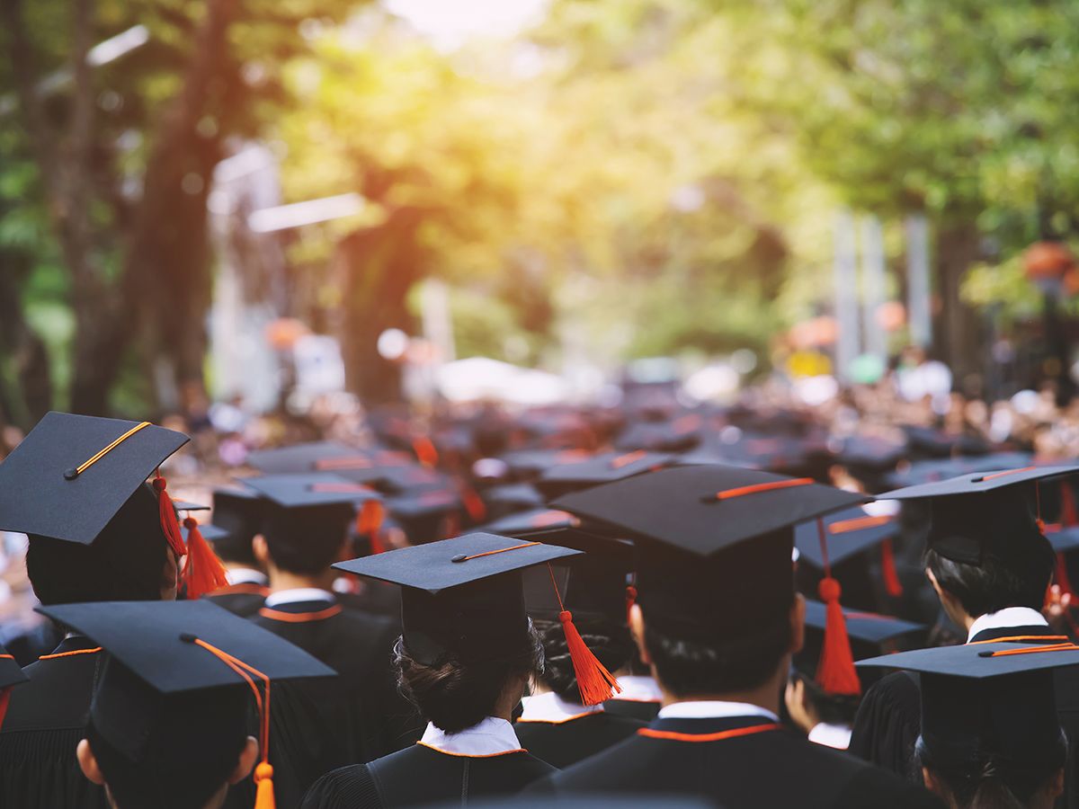 backside graduation hats during commencement success graduates o