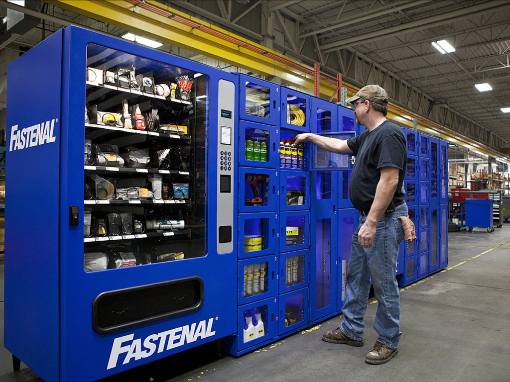 Fastenal vending machine with man selecting item