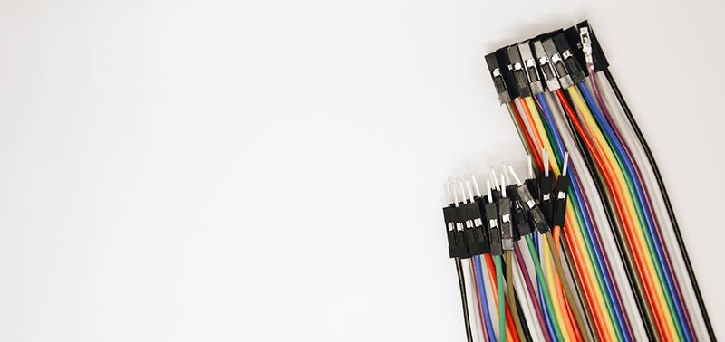 multicolored electrical wiring on white background