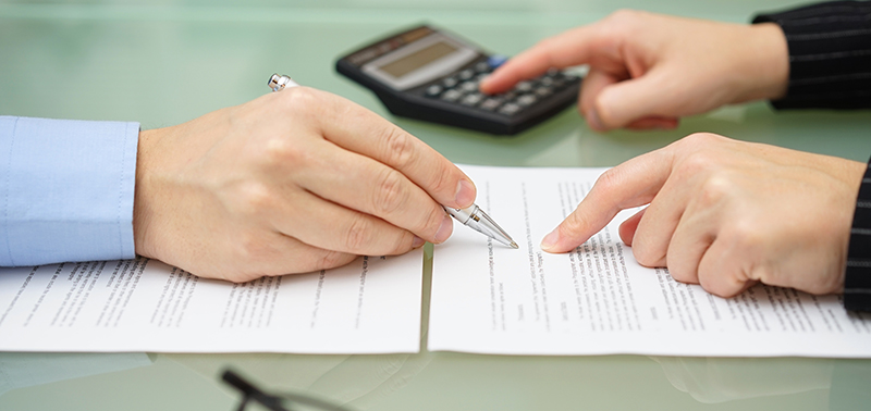 calculating cost to serve with two people reviewing a contract