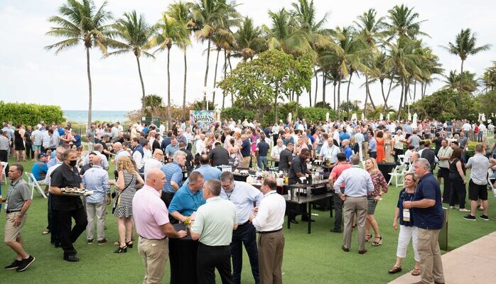 NAHAD 2022 attendees mingle on the Ocean Lawn of The Fontainbleau Luxury Hotel and Resort in Miami Beach.
Credit: NAHAD
