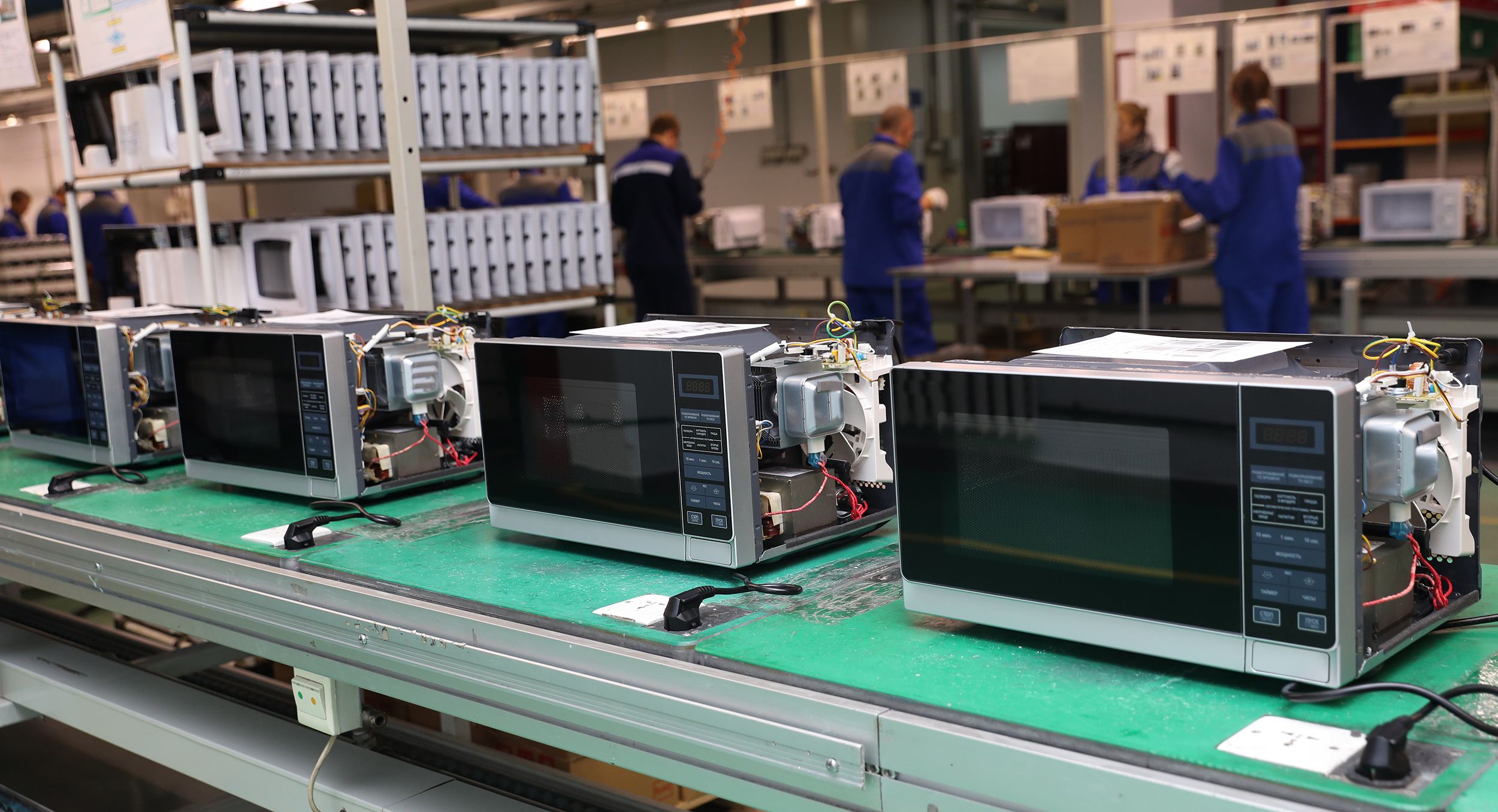 Manufacture of microwave ovens. Assembly line