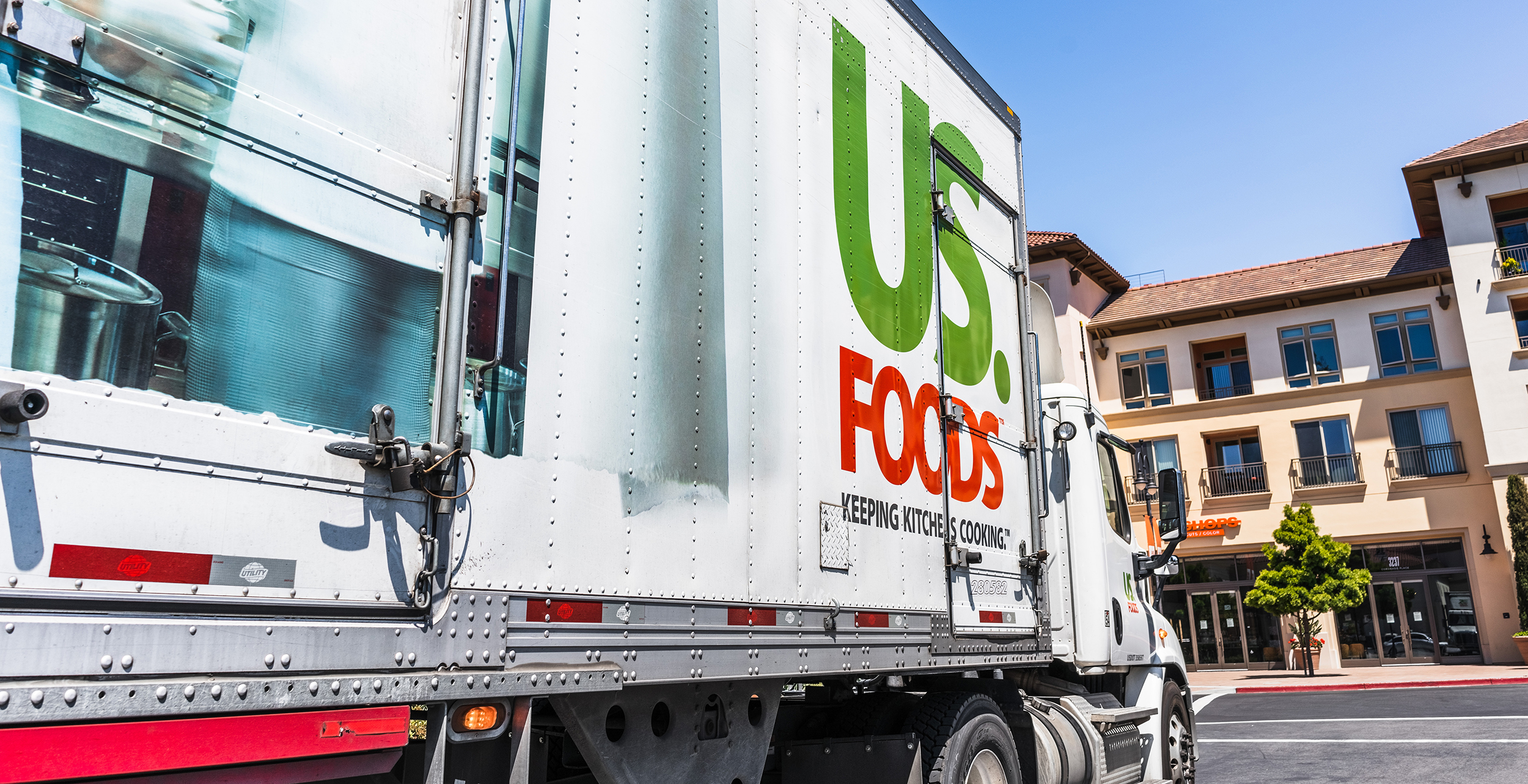 May 5, 2020 Santa Clara / CA / USA - US Foods truck driving on a street in San Francisco bay; US. Foods is an American food-service distributor