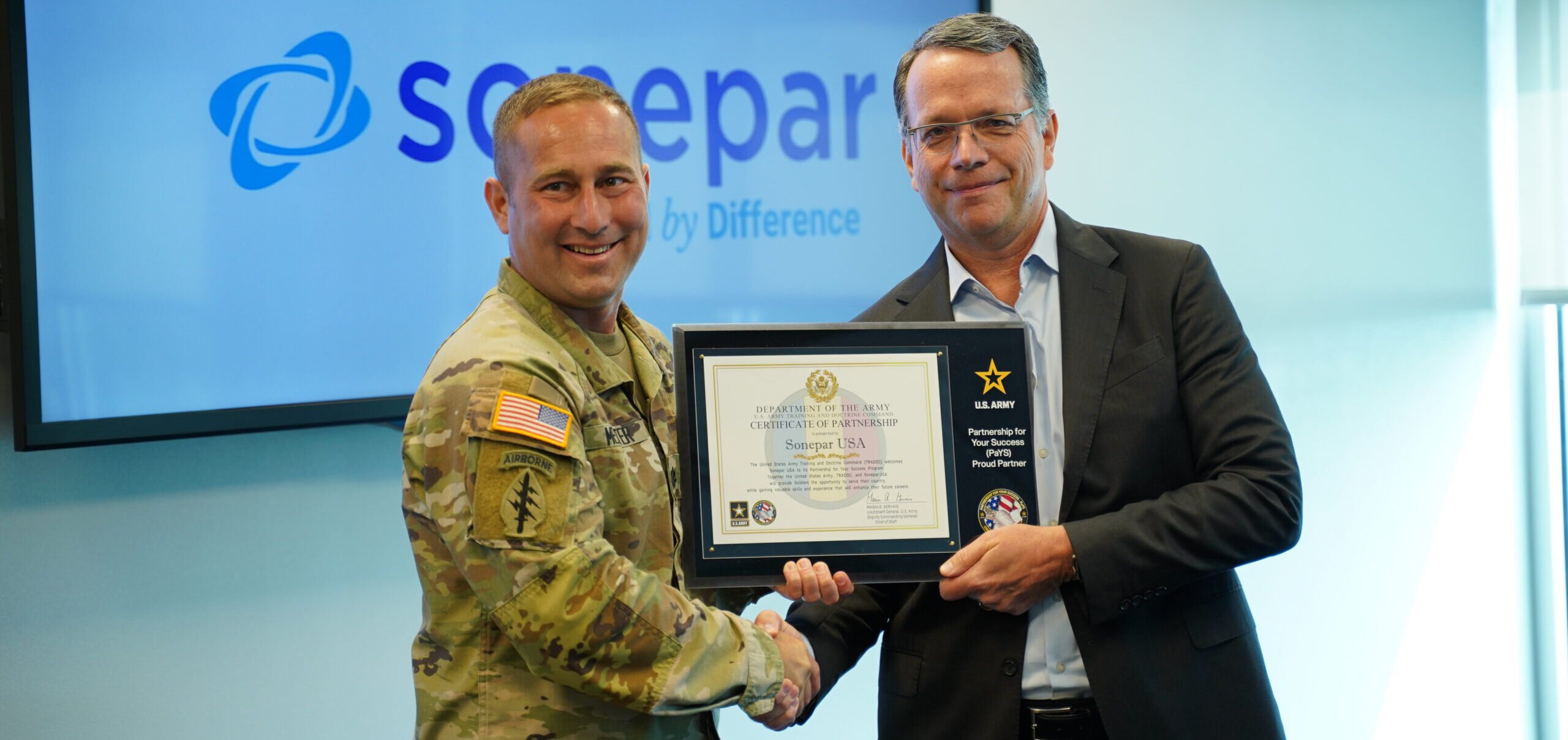 Right to left: Rob Taylor, President of Sonepar North America, and Colonel Meister