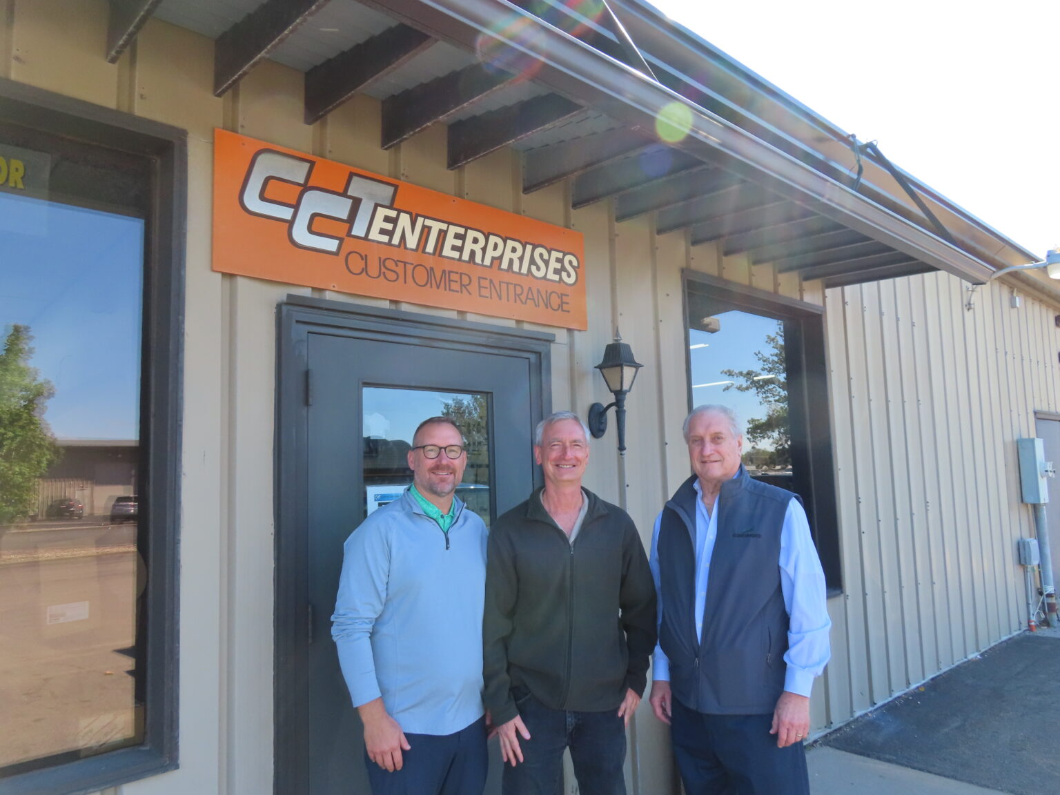 Paul Kundinger, Craig Radloff and Tom Kundinger, Sr. celebrate the next chapter for CCT Enterprises as a division of Kundinger, Inc.