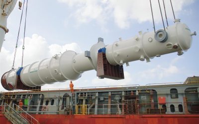 A completed LNG heat exchanger manufactured at Air Products' Port Manatee facility is being loaded on a carrier at the Port of Manatee for shipment to the customer. (Air Products photo)