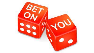 bet on you words on two red dice over white background