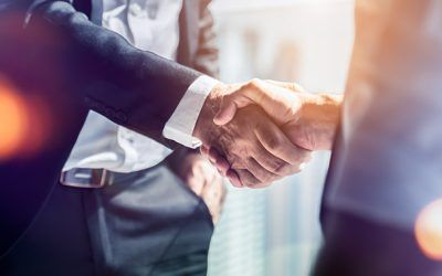 Businessman handshake for teamwork of business merger and acquis