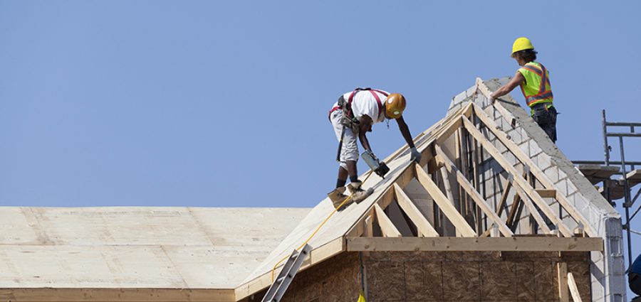 Workers working on the roof