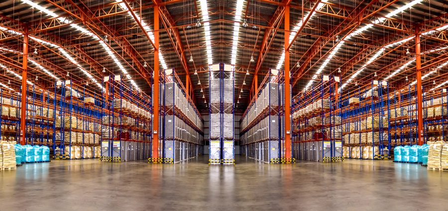 Warehouse industrial and logistics companies. Commercial warehouse. Huge distribution warehouse with high shelves. Bottom view.